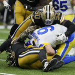 Dalton thrives, Stafford leaves, as Saints top Rams 27-20