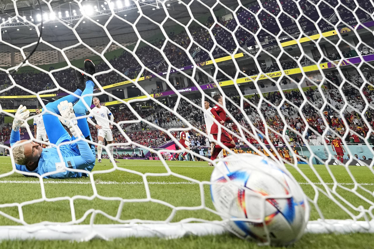 Spain's Marco Asensio scores his side's second goal during the World Cup group E soccer match betwe...