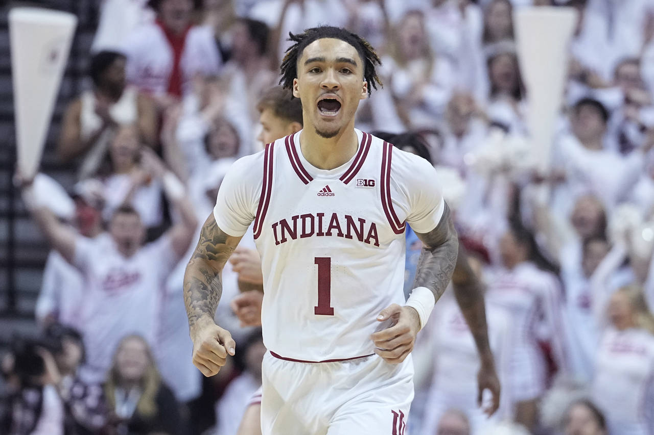 CORRECTS CITY TO BLOOMINGTON, INSTEAD OF INDIANAPOLIS - Indiana guard Jalen Hood-Schifino (1) react...