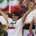 Barred from stadiums at home, Iran women travel to World Cup