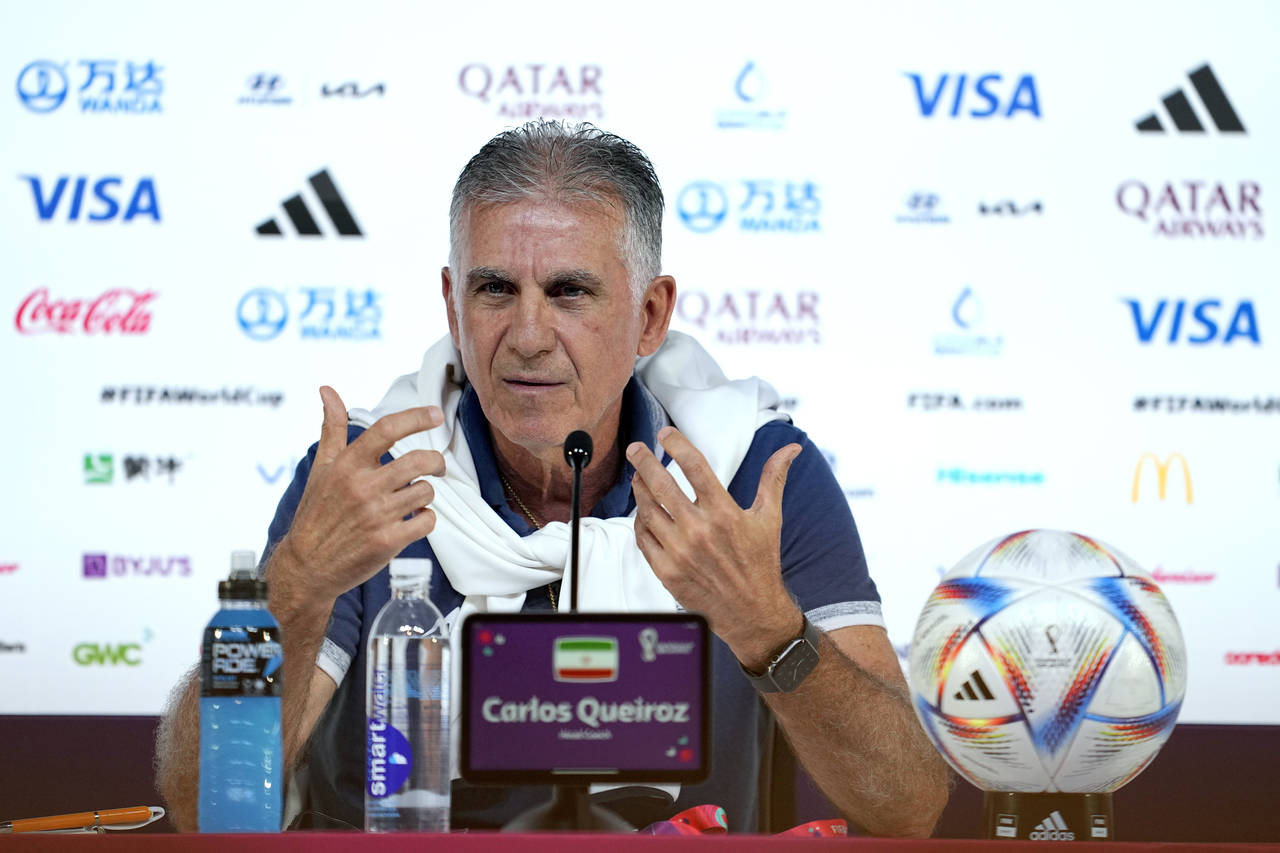 Iran's head coach Carlos Queiroz speaks during his press conference at the World Cup press centre i...