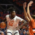 Hawkins has triple-double, No. 16 Illinois thumps Syracuse