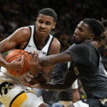 Murray has career night: 31 points, 20 rebounds in Iowa win
