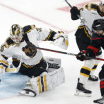 Bruins set NHL record: 12 straight home wins to start season