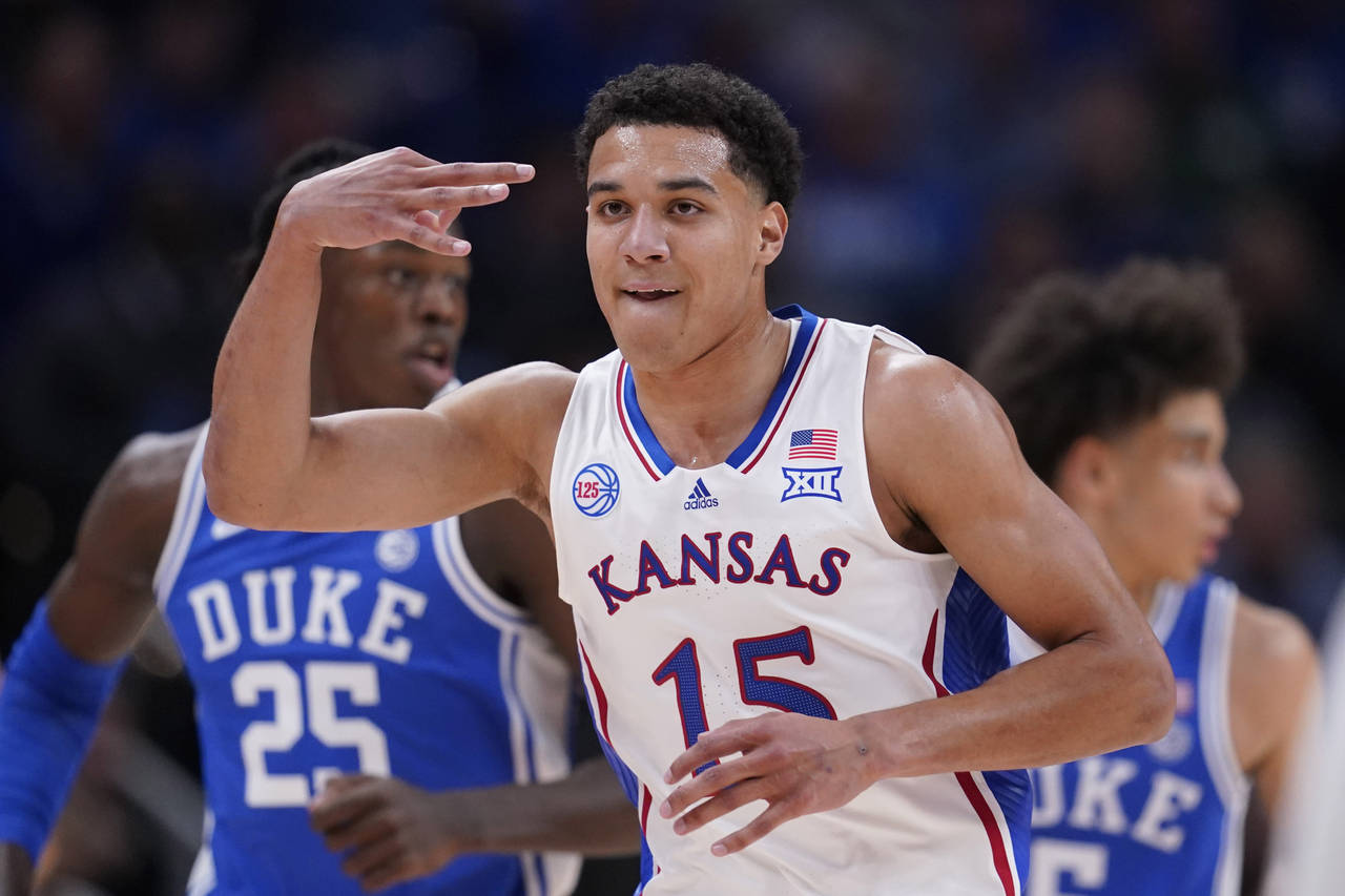 Kansas guard Kevin McCullar Jr. (15) celebrates a score against Duke during the first half of an NC...