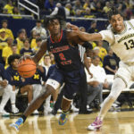 Howard scores 19, Michigan turns back Jackson State 78-68