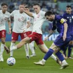 Messi and Argentina advance at World Cup, beat Poland 2-0