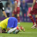 Crying Neymar injures ankle during Brazil's World Cup win