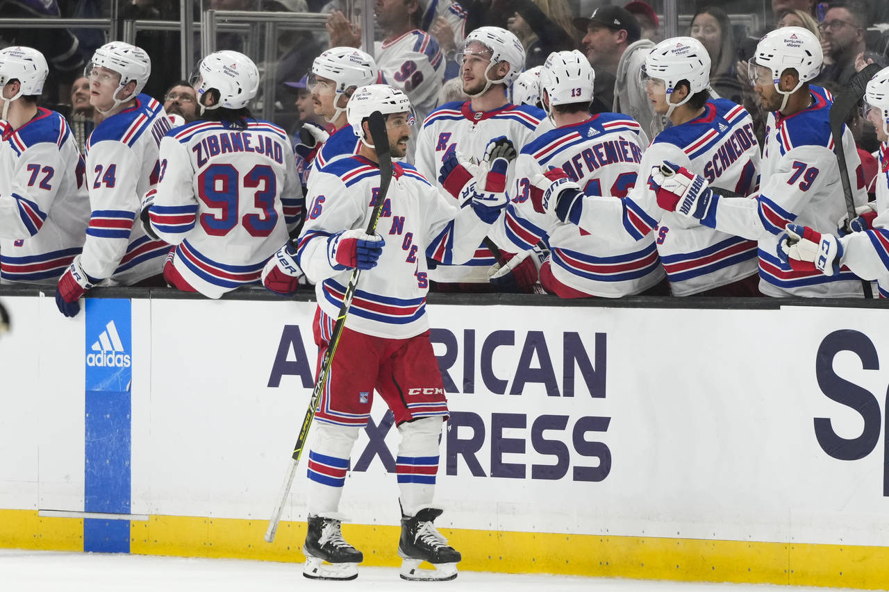 New York Rangers' Vincent Trocheck celebrates his goal during the second period of an NHL hockey ga...