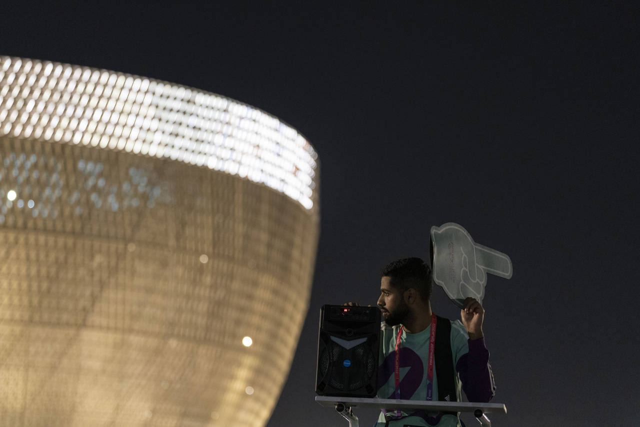 Osama, 21 years-old, from Palestine works as a street marshal prior to the World Cup group G soccer...