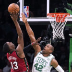 Tatum scores 49, Celtics hold off hot-shooting Heat 134-121