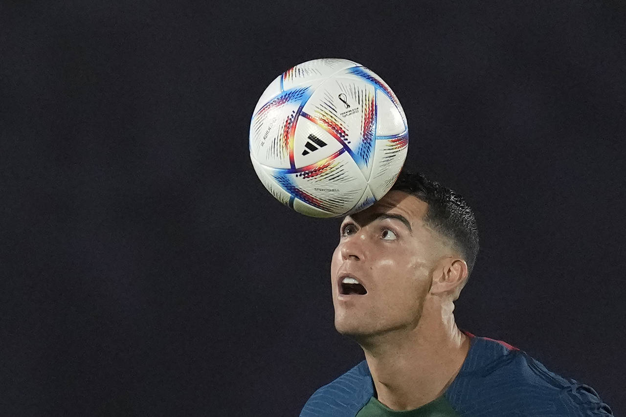 Portugal's Cristiano Ronaldo controls a ball during the Portugal's official training on the eve of ...