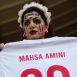 Iran regime supporters confront protesters at World Cup game