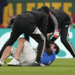 Protestor with rainbow flag runs onto field at World Cup