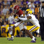 Daniels, No. 15 LSU outlast No. 6 Alabama, 32-31 in OT