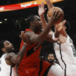 Irving scores 29, Nets beat depleted Raptors 112-98