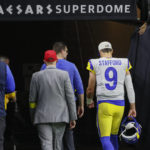 Dalton thrives, Stafford leaves, as Saints top Rams 27-20