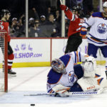 Devils top Oilers, tie franchise mark with 13th straight win