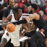 Scott scores 18, No. 22 Maryland blows out Louisville 79-54