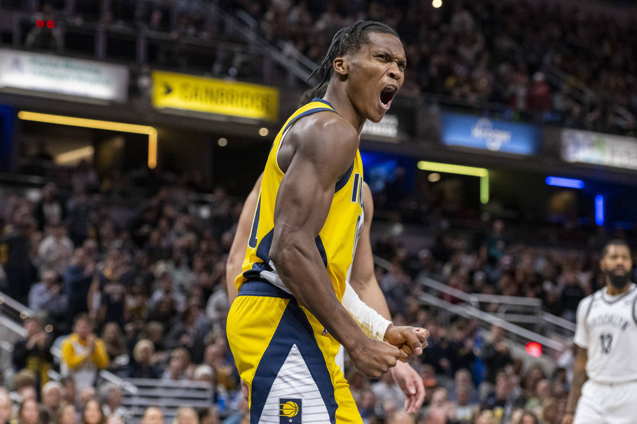 Indiana Pacers guard Bennedict Mathurin (00) reacts after being fouled while scoring during the sec...
