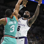 Lakers top Spurs in James' return for first road victory