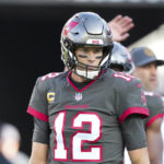 Sports unraveled, collided with politics, racism in 2022