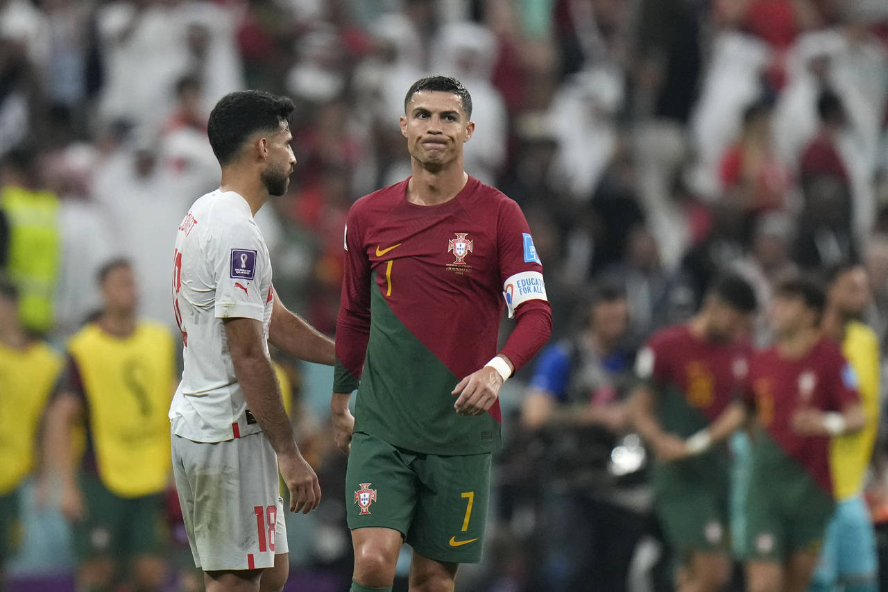 Portugal's Cristiano Ronaldo walks during the World Cup round of 16 soccer match between Portugal a...