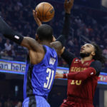 Mitchell scores 34, Cavaliers top Magic 107-96