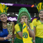 At World Cup, women fans shrug off worries over dress codes