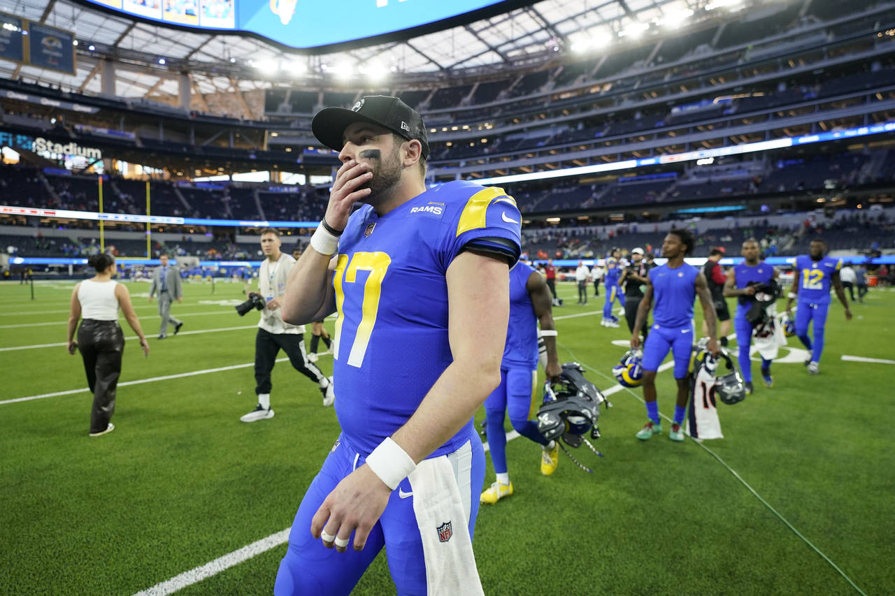 Los Angeles Rams quarterback Baker Mayfield leaves the field after their win against the Denver Bro...