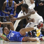 West Virginia honors Huggins with 96-78 win over Buffalo