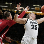 Clark scores 45, but No. 12 NC State tops No. 10 Iowa 94-81