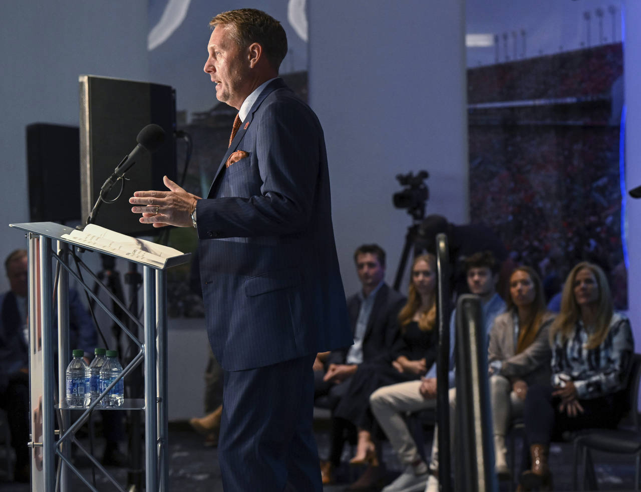 Newly named Auburn football coach Hugh Freeze talks after being introduced at a news conference Tue...