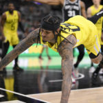 Vassell, Johnson help Spurs hold on to beat Jazz, 126-122