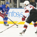 Rangers win 4-3 in OT to end Devils' 11-game road win streak