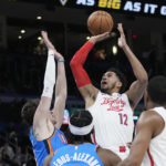 Embiid has triple-double in 76ers' road victory over Thunder