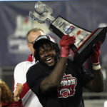 Wisconsin beats Oklahoma State 24-17 in Guaranteed Rate Bowl