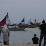 AP PHOTOS: Camels a common sight for World Cup visitors