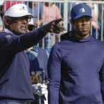 Woods and son hobble to a 59 and are 2 back of Team Thomas