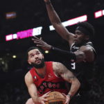 Fox has 27 points and 10 assists, Kings beat Raptors 124-123