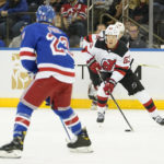 Rangers win 4-3 in OT to end Devils' 11-game road win streak