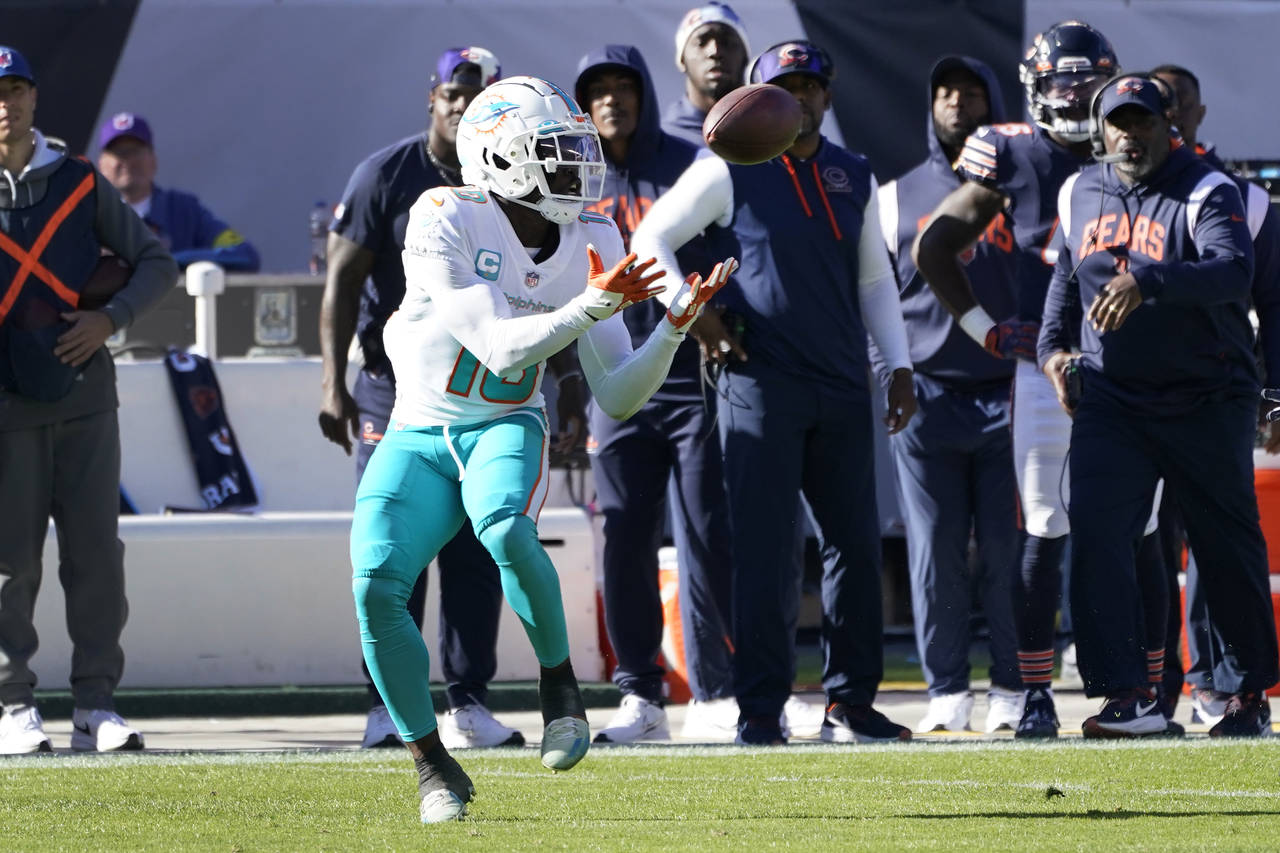 Miami Dolphins wide receiver Tyreek Hill catches a pass during the first half of an NFL football ga...