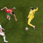 AP PHOTOS: World Cup highlights from Day 23