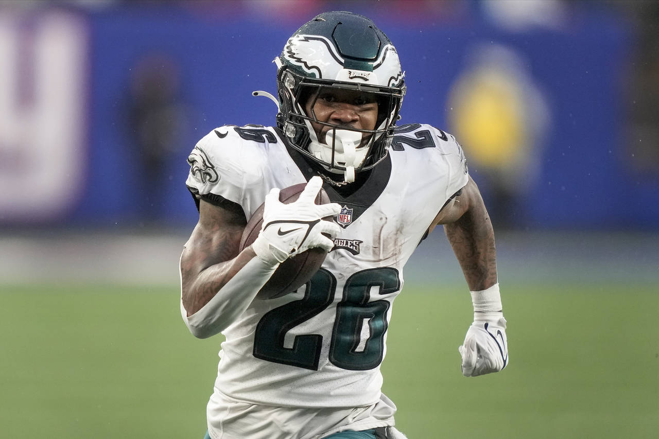 Philadelphia Eagles running back Miles Sanders (26) runs for a touchdown against the New York Giant...