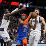Doncic scores 38, Dinwiddie 20 as Mavs beat Thunder 121-114