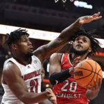 Louisville gets first win of season behind Ellis' 30 points