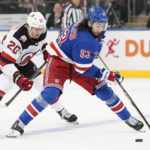 Rangers win 4-3 in OT to end Devils' 11-game road win streak