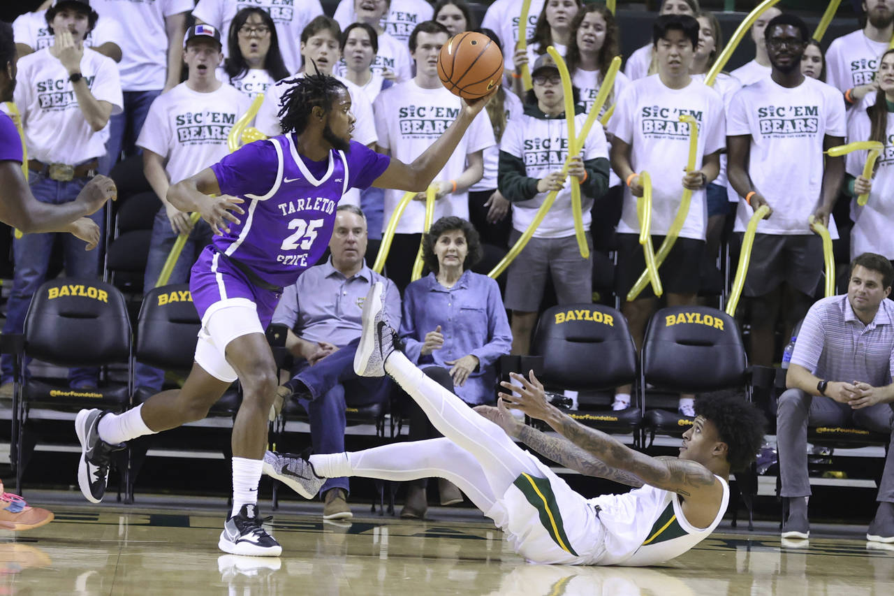 Tarleton State forward Coreyoun Rushin (25) grabs a loose rebound over Baylor forward Jalen Bridges...