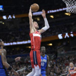 Porzingis, Wizards beat Magic 119-100 for 4th straight win