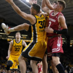 Wahl sparks Wisconsin to 78-75 victory over Iowa in overtime
